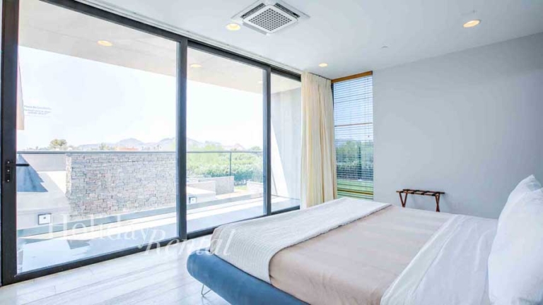 bedroom with window views vacation rental